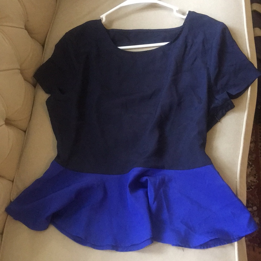Peplum blouse with cut out scoop back